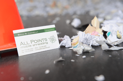 All Points Mobile Shredding Business Card beside shredded paper