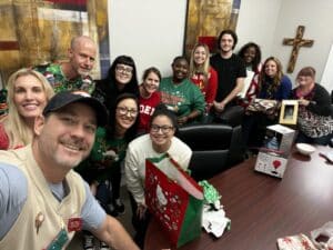 Happy All Points Medical Waste Employees at a Christmas Party