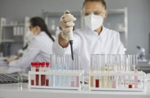 Scientist conducting lab tests in a Florida biotech facility.