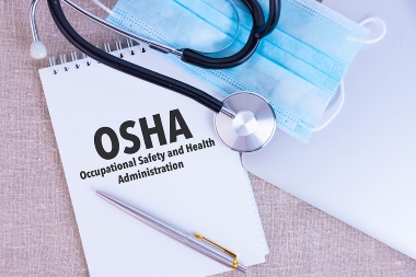 OSHA Occupational Safety and Health Administration, the text is written in a notebook.